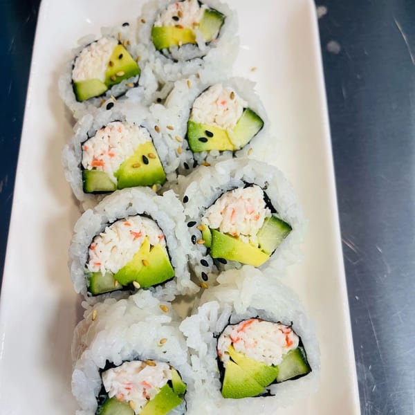 Hornbill Sushi's California rolls with crab, avocado, and cucumber, topped with sesame seeds.