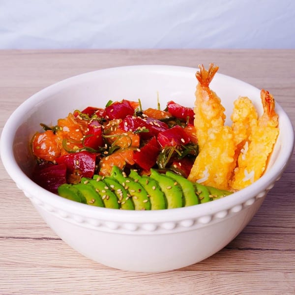 Hornbill Sushi & Asian Fusion poke bowl with tuna, salmon, avocado, and tempura shrimp.